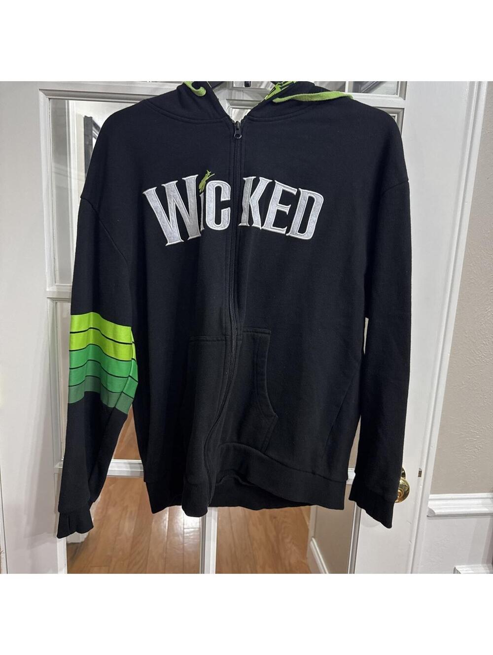 Wicked zip up hoodie with green stripes on the sleeve